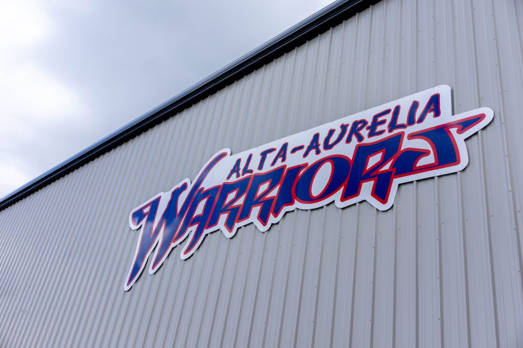 Exterior sign of Alta-Aurelia Warriors building JC Toland worked on.