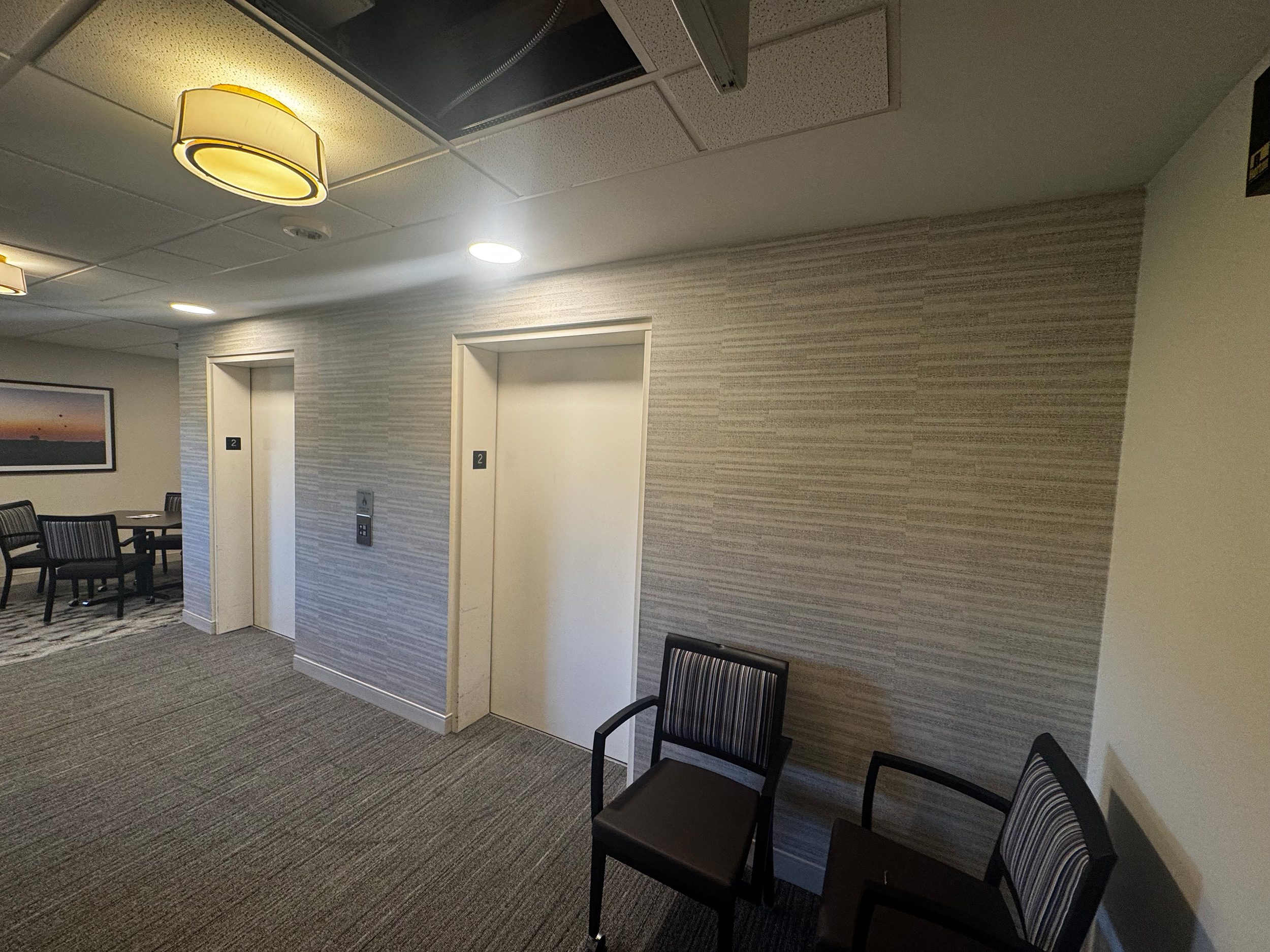 High performance vinyl wall covering around elevators from JC Toland