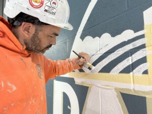 Jon Watkins, 2026 q2 employee of the month, doing a detailed paint job.